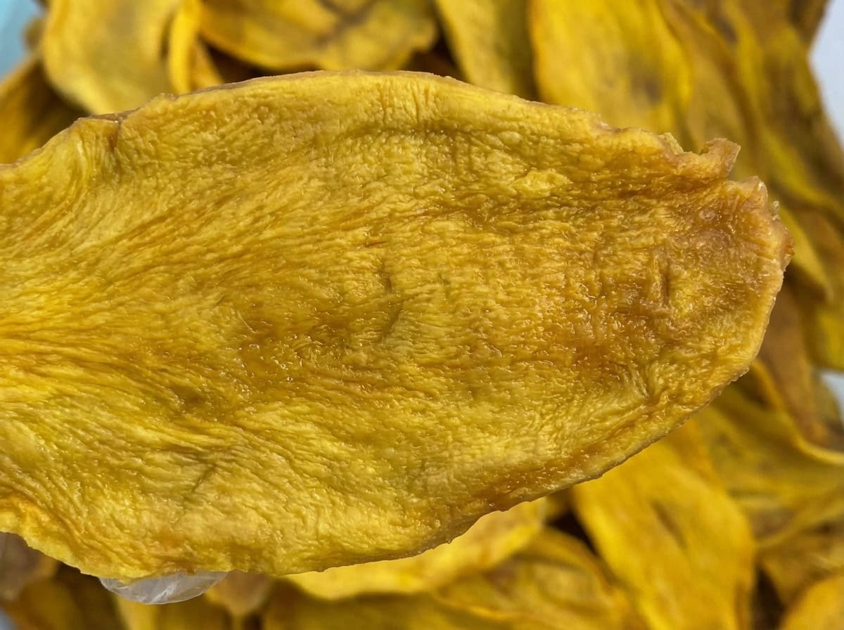 Macro Photography Of Natural Fiber Texture And Moisture In Premium Vietnamese Dried Mango