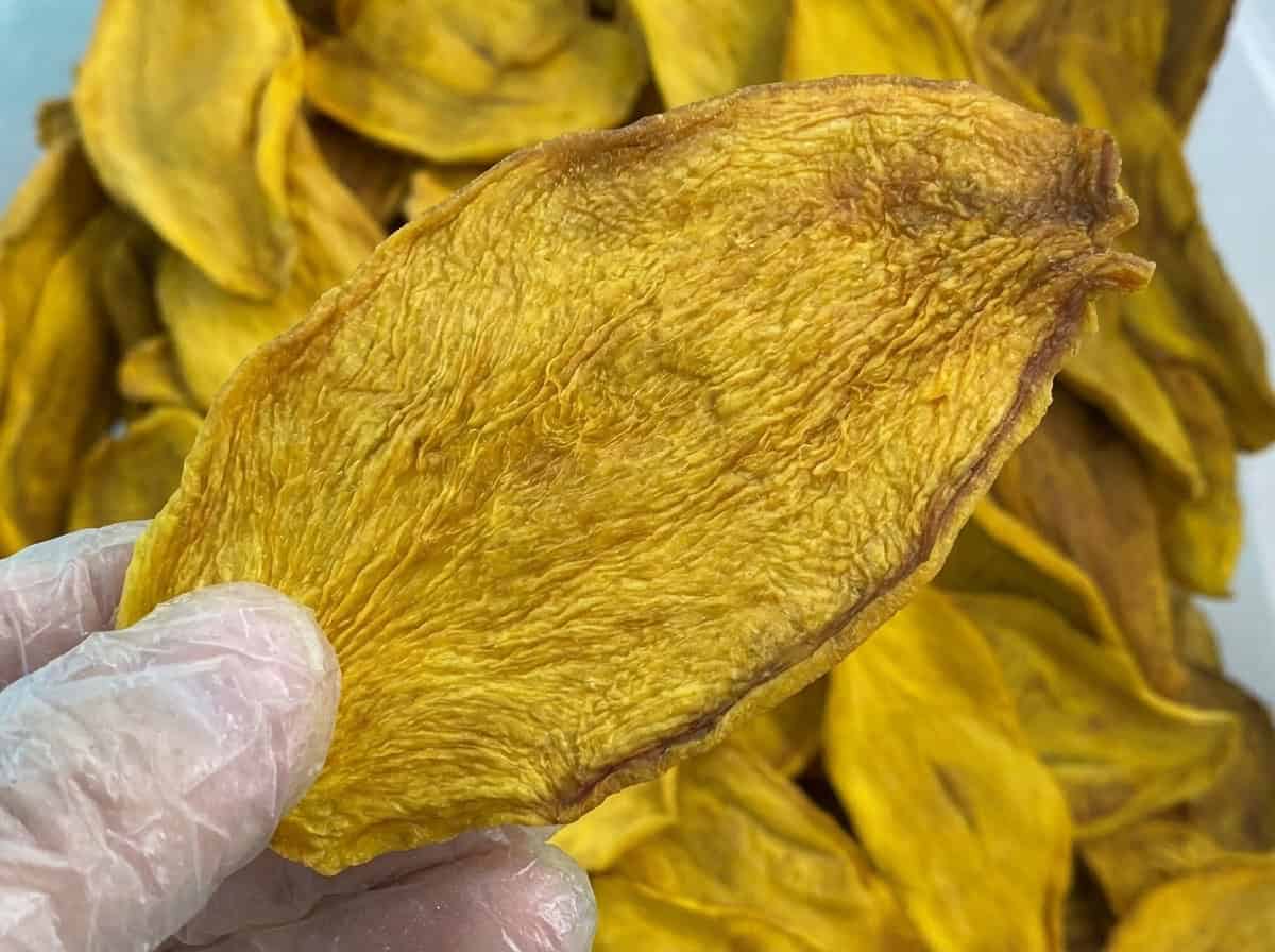 Dried Mango HS Code Guide: US, EU & UAE Classification Macro Shot Showing The Natural Fibrous Texture Of Fruitbuys Vietnam No Added Sugar Dried Mango
